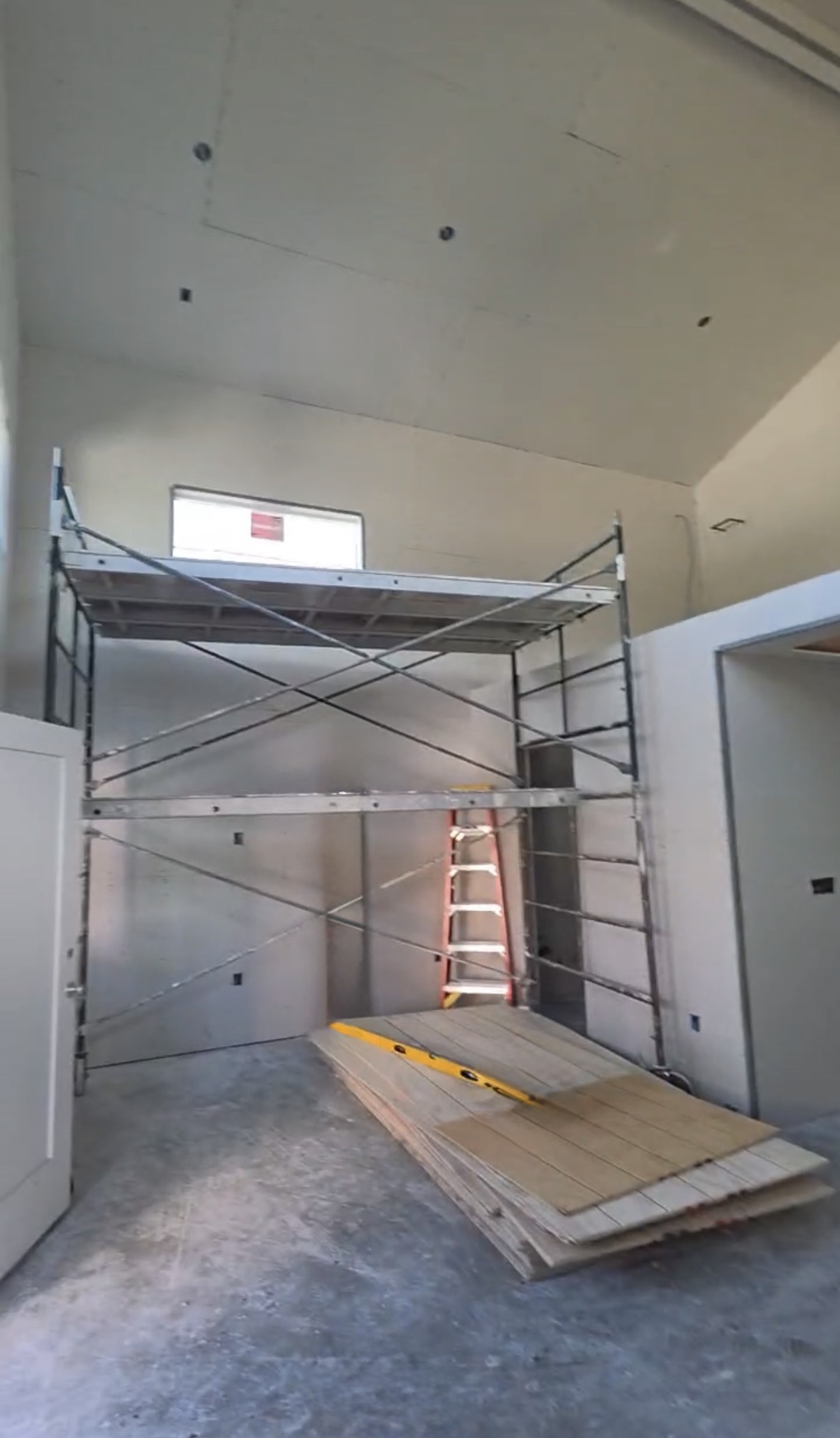 Tall vaulted residential interior completed by JD’s Drywall